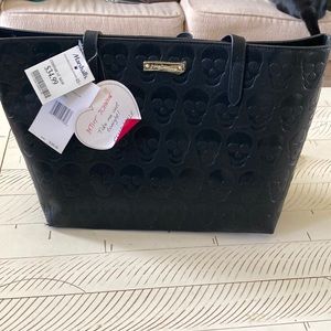 Betsey Johnson tote w embossed skull print
